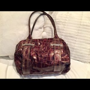 Guess brown embossed Purse.